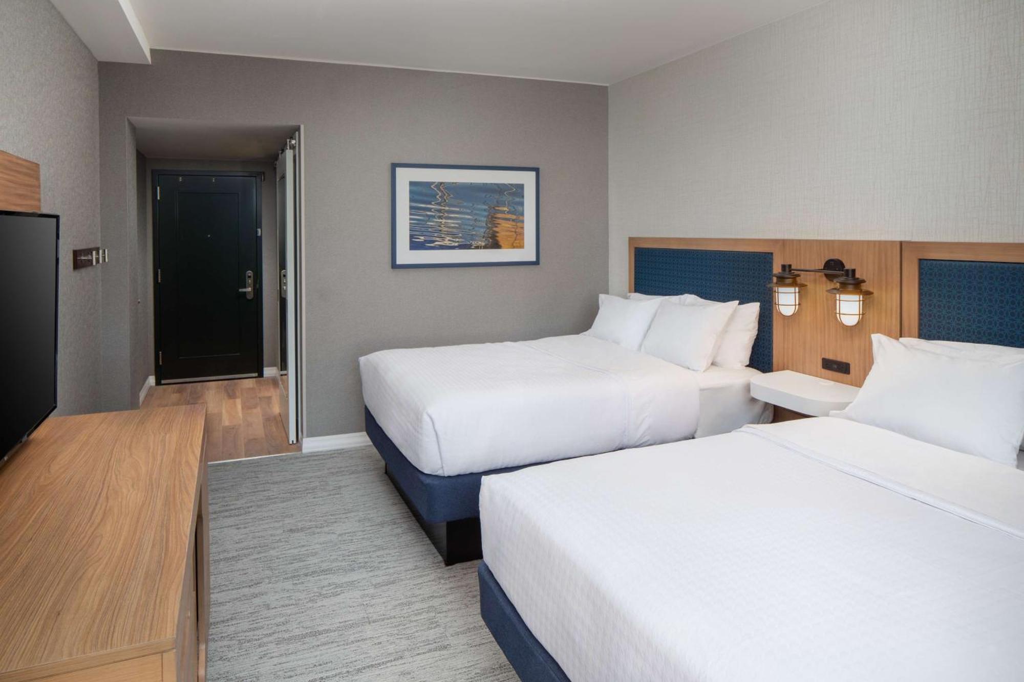 Queen Room with Two Queen Beds with Sofa Bed and Water View - Mobility Accessible